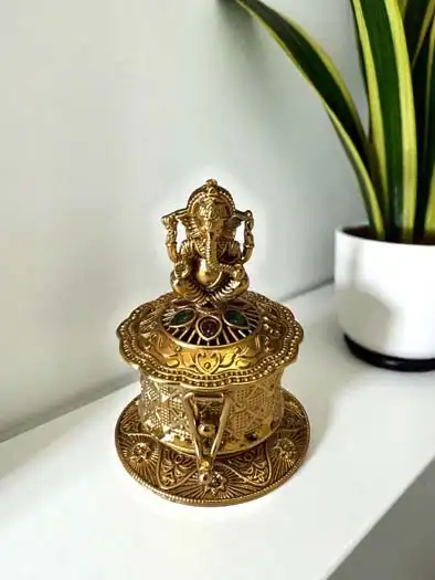 Gold Finish Kumkum Dabbi With Ganesh Ji Idol